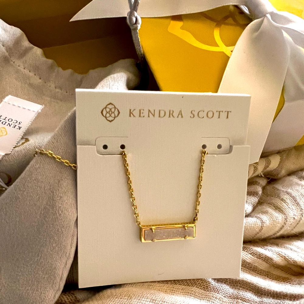 Kendra Scott necklace. NWT. Includes pouch and box with bow.